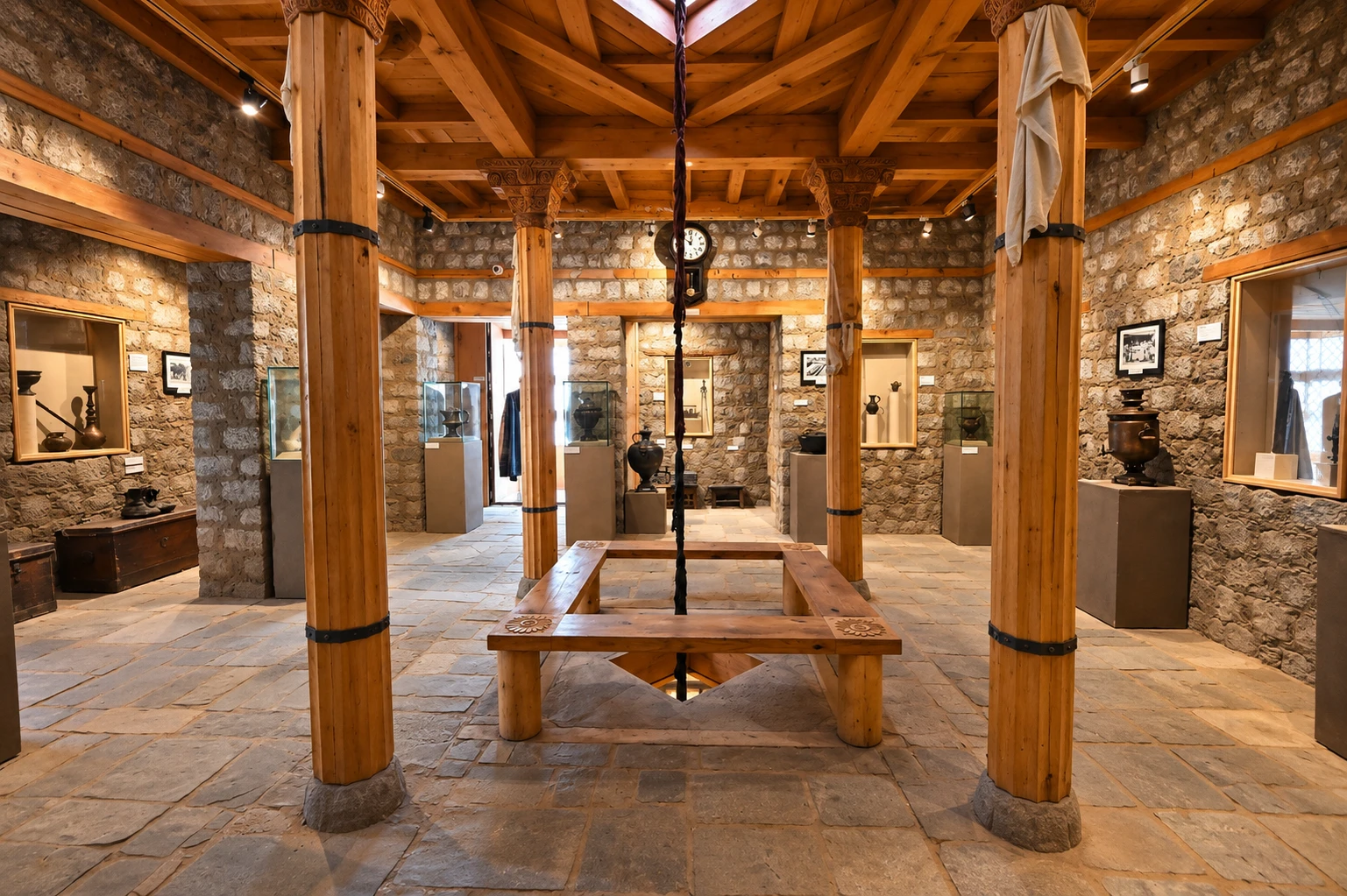 Central Asian gallery with a samovar, metal vessels and fluted timber columns