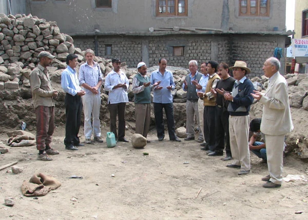 Prayers are held as the foundation stone is laid.