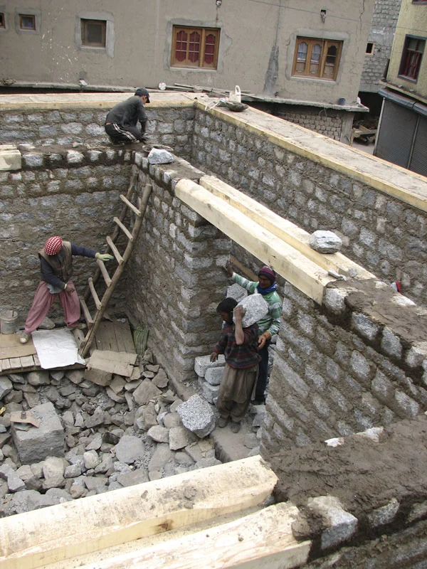 Inner and outer walls rise together.